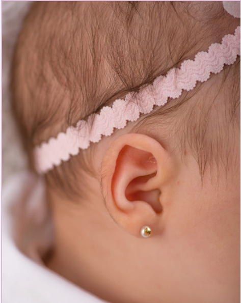 puesta pendientes bebés